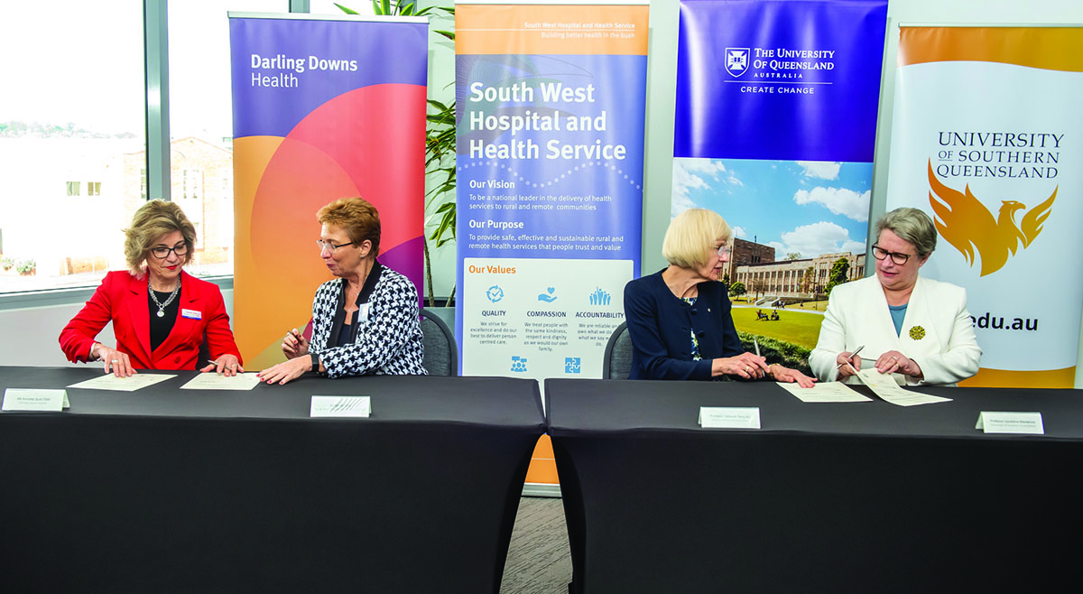 Executives from Darling Downs Health, South West Hospital and Health Service, The University of Queensland and the University of Southern Queensland signing a Memorandum of Understanding to establish the Darling Downs - South West Medical Pathway.