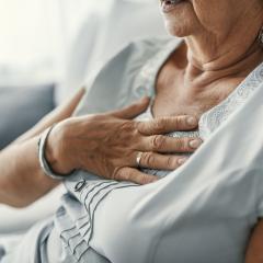 Lady with hand on heart