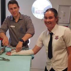 Student learning to cast 