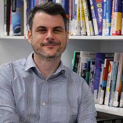 Man sitting in medical library